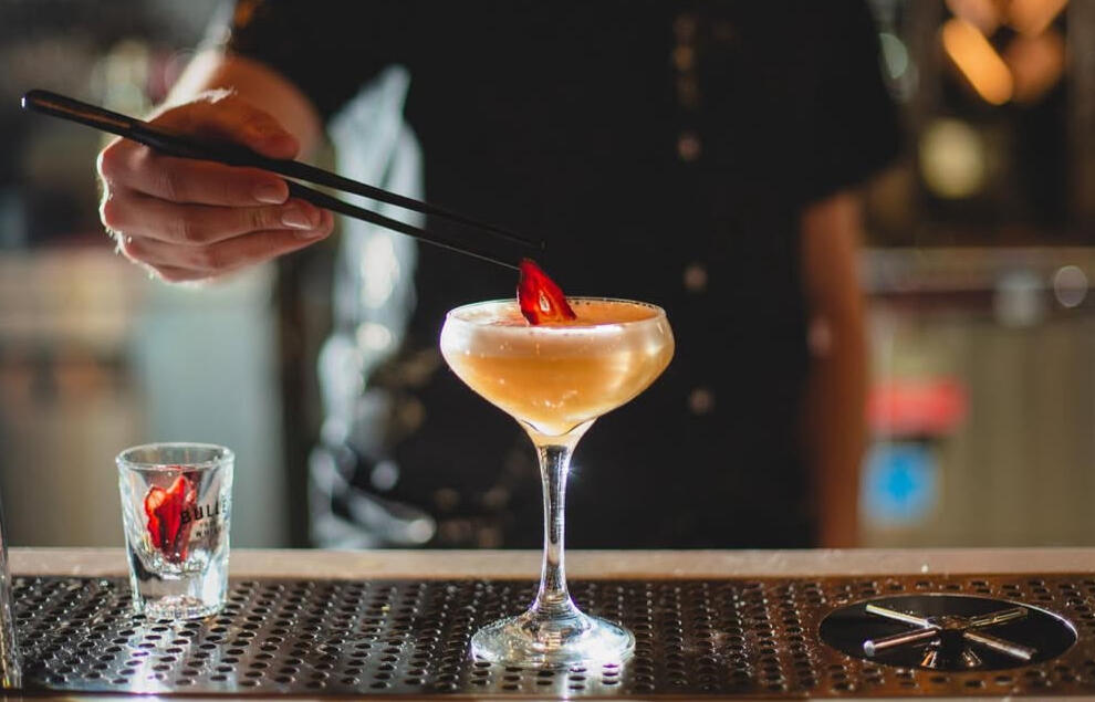 Elijah Craig rye, Frangelico, strawberry syrup, lemon juice, egg white, rhubard bitters, dehydrated strawberry